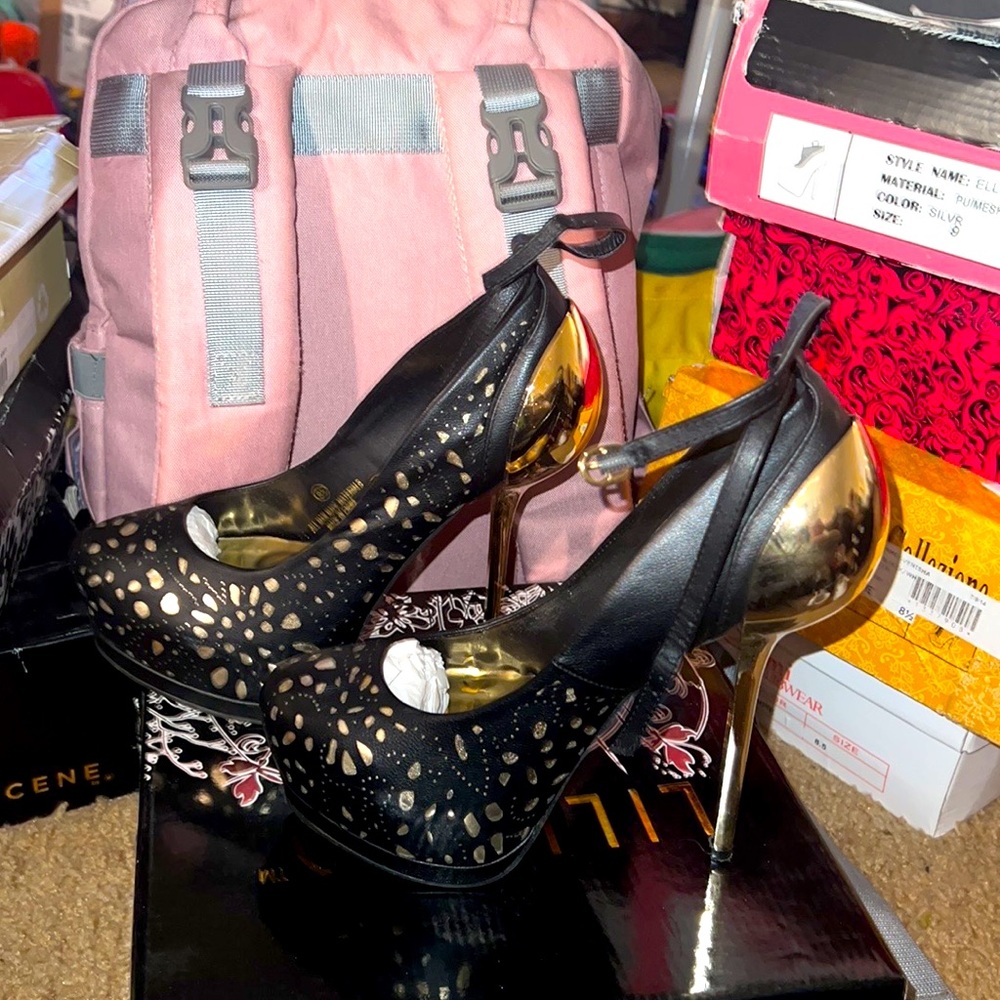 Gold and black heels